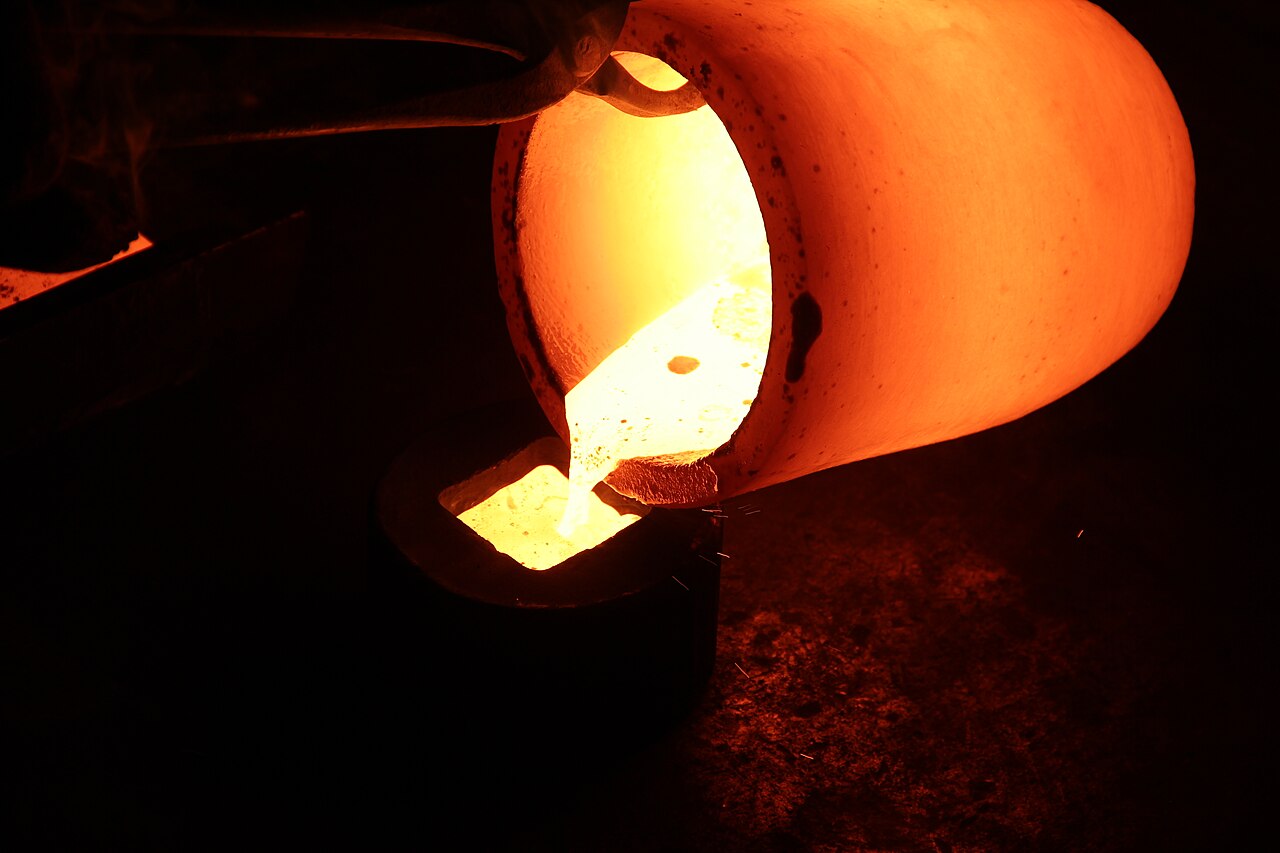 Molten gold being poured into a mould